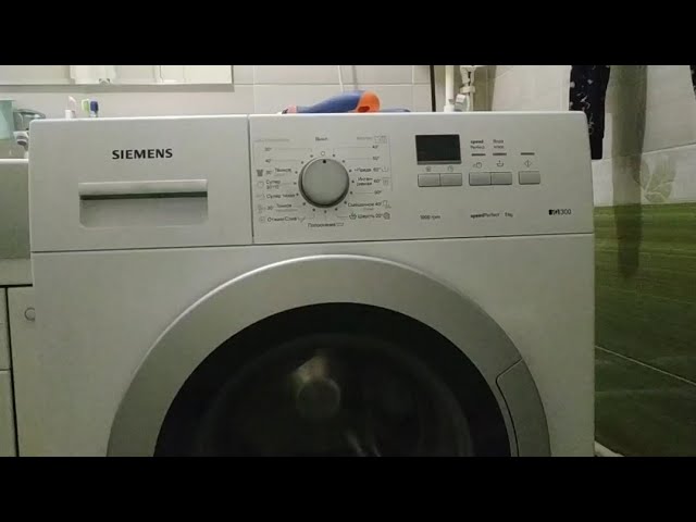 Разбор стиральной машины Siemens IQ300. Снятие панели и устранение течи.
